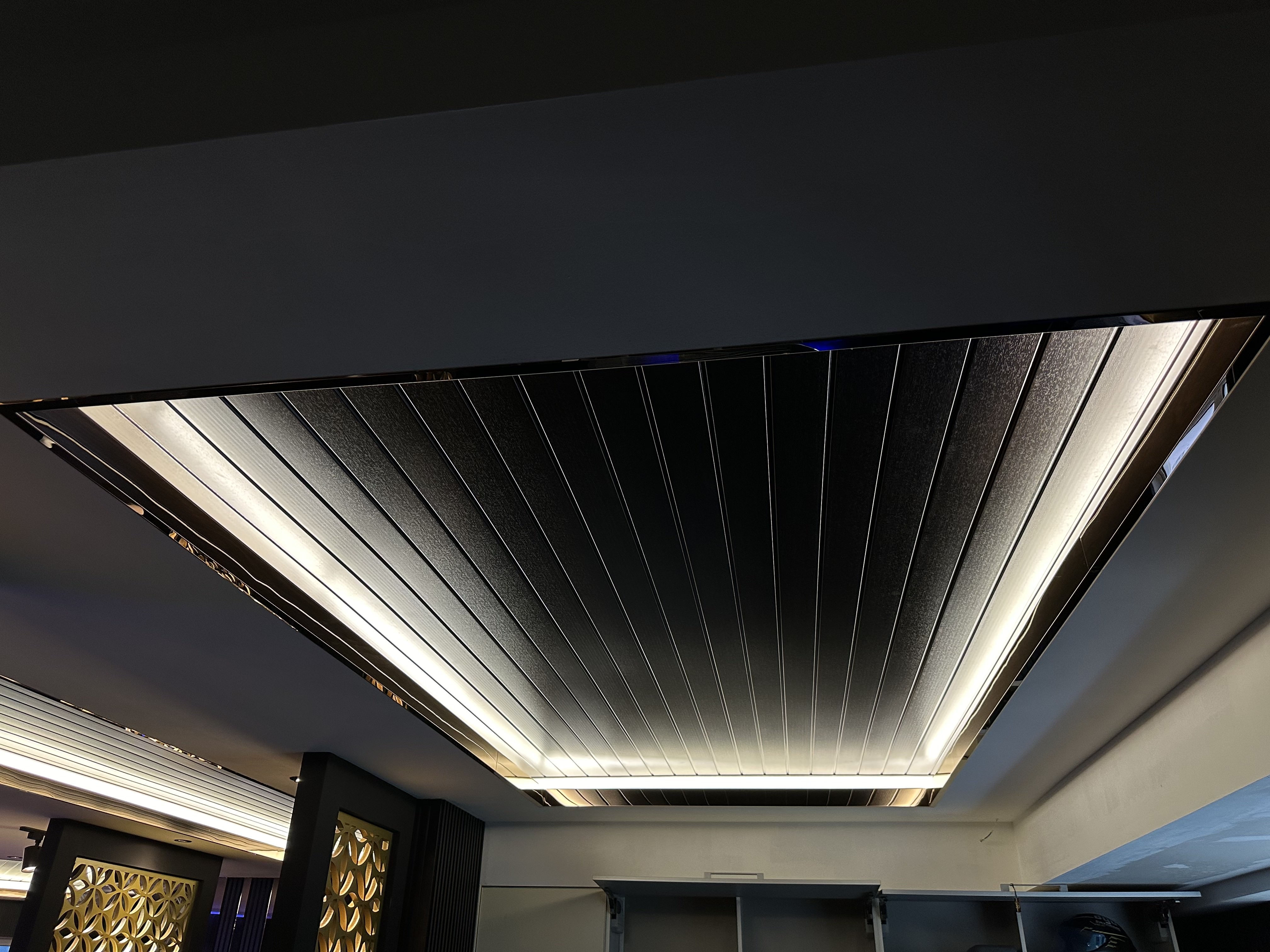 Metal ceiling panel and cove lighting Kuching renovation